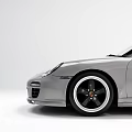 Silver Two Door Sports Car With Sleek Body And Black Wheels