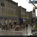 Vibrant Commercial Street With Modern Buildings Storefronts Pedestrians And Outdoor Greenery