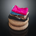 Colorful Fabrics With Soft Textures Stacked On Woven Mats Black Background
