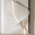 Modern Wall Decor With Spiral Design Illuminated Accents And Dark Frame On White Wall