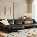 Black Sectional Sofa With White and Orange Pillows In Modern Living Room With Dot Rug