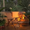 Relaxing Outdoor Wicker Chair on Cozy Patio with Green Plants Flowers Lanterns and Side Table