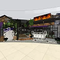 Outdoor Restaurant With Purple Awning Iron Fence Vines Green Plants And Wooden Decor