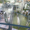 Modern Swing Doors For Futuristic Urban Buildings With Green Areas And Sky Bridges