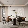 Modern Restaurant Interior With Round Dining Table Gray Brown Chairs Pendant Light And Abstract Painting