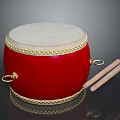 Traditional Red Drum With White Head Golden Decorations And Wooden Drumsticks
