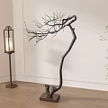 Bonsai Plant With Curved Trunk And Dried Branches On Square Wooden Base With Lantern Floor Lamp In Indoor Space
