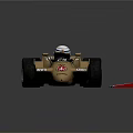 Gold March 761 Race Car With Number 55 Driver And Red White Barriers