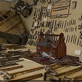 Antique Tools Collection Featuring Various Hanging Wall Tools And Table Displays 3d model