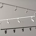 Modern Track Mounted Downlights And Spotlights With White And Black Frames Adjustable Directional Lighting Fixtures