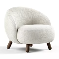 Plush Light Beige Accent Chair With Rounded Design And Wooden Legs