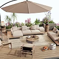 Comfortable Outdoor Sofa Set On Wooden Deck With Patio Umbrella Hammock Chair And Greenery