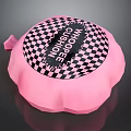 Pink Round Whoopee Cushion With Black And White Checkerboard Pattern