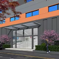 Industrial Factory Building With Gray Orange Exterior Blue Glass Windows And Pink Flowering Trees