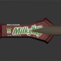 Milk Way Chocolate Bar With Red Wrapper Partially Unwrapped Showing Tasty Filling