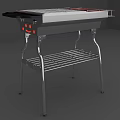 Portable Outdoor Grill With Silver Metal Body Red Indicator Lights And Lower Rack