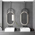 Double Vanity Sink with Oval Backlit Mirrors on Gray Marble Wall and Green Plant