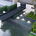 Modern Building Exterior With Decorative Water Fountain Greenery Tree And Steps