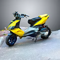 Yellow And Black Scooter Motorcycle Parked Roadside Near Stone Steps And Grass