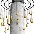 Yellow Gourd Shaped Chandelier With Black Circular Structure Around Concrete Pillar