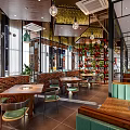 Modern Restaurant Interior With Brick Partition Wooden Table Metal Chairs And Green Plants