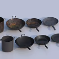 Assorted Cast Iron Cookware With Frying Pans Woks And Saucepan In Black Finish