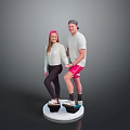 Young Woman And Young Man Standing On White Circular Platform With Black Foot Plates