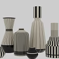 Stylish Ceramic Vessels With Black And White Stripes And Various Shapes And Modern Design