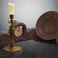 Vintage Brass Candlestick Lamp With Carved Base And Decorative Plate On Wooden Stand