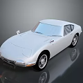 Classic Silver Two Door Sports Car With Sleek Retro Design And Reflective Surface