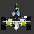 Robot Car With White Chassis Yellow Wheels Electronic Components And Colorful Wires