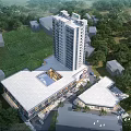Modern Commercial Complex Featuring Tall Building Green Spaces And Surrounding Trees