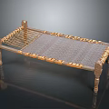 Traditional Wooden Footstool With Handwoven Wicker Surface Ornate Edge Details And Carved Legs