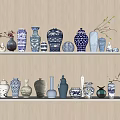 Decorative Ceramic Vessels with Blue and White Patterns Displayed on White Shelves for Home Decor