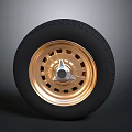 Sleek Car Parts Black Tire And Gold Perforated Wheel Rim Design