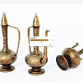 Vintage Brass Teapots Featuring Intricate Carvings Three Pieces