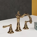 Elegant Golden Faucet With Two Handles And Transparent Stone On White Counter