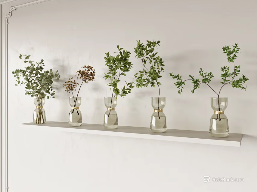 Multiple Clear Glass Flower Vases With Green Foliage On White Wall Shelf 3d model 