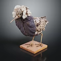Bird With White Fluffy Head Dark Body Patterned Wings On Wooden Base Against Dark Background
