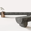 Modern Landscape Seats With Gray Stone Surface And Copper Bases Holding Small Potted Plants