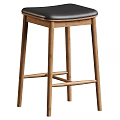Modern Wooden Bar Stool With Black Padded Seat And Sturdy Support Legs