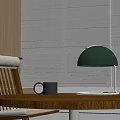 Wooden Table With Green Desk Lamp Black Mug Chair And Window Background