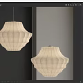 Beige Fabric Pendant Light With Pleated Design Hanging Against Gray Wall