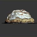 Freshly Baked Cinnamon Roll With Cream Cheese Frosting And Cinnamon Sprinkles