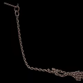 Heavy Duty Industrial Iron Chains Piled On Ground With Hanging Link