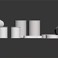 Multiple Silver Reflective Metal Cans for Food Storage in Various Shapes on Black Background