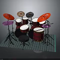 Colorful Toy Drum Set With Red Drums And Colored Cymbals On Green Mat