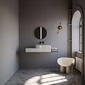 Modern Bathroom Interior Featuring Wall Mounted White Sink Round Mirror And Freestanding Bathtub