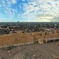 Cartoon Scenery Of Ancient City With City Wall Working People And Distant Buildings