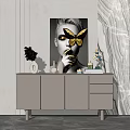 Modern Entryway Side Cabinet With Decorative Vases Artwork And Sculpture
